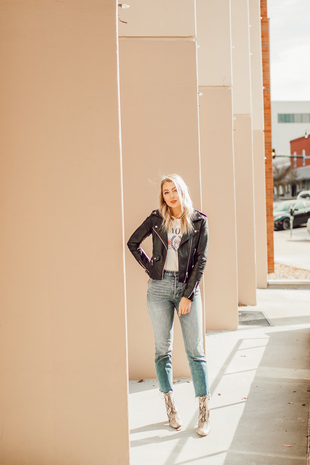 straight leg jeans with ankle boots and a leather jacket