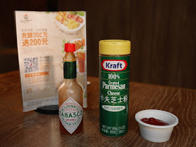 Tabasco sauce, Kraft grated parmesan cheese, and ketchup
