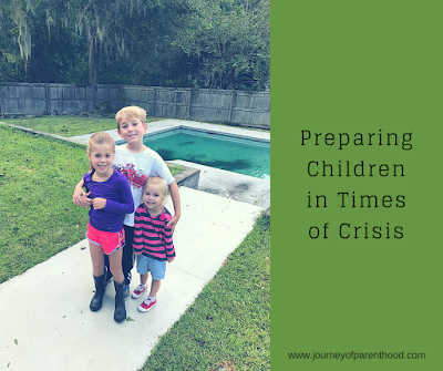 Text: Preparing Children in Times of Crisis www.journeyofparenthood.com  Picture: 2 girls and a boy huddled in front of a backyard pool