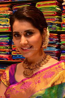 Raashi Khanna in colorful Saree looks stunning at inauguration of South India Shopping Mall at Madinaguda
