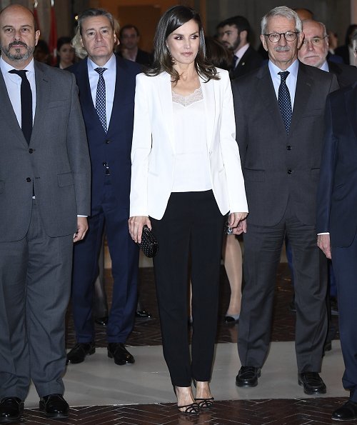 Queen Letizia wore a white blazer by Spanish fashion designer Felipe Varela, and Hugo Boss satin top, Hugo Boss black trousers