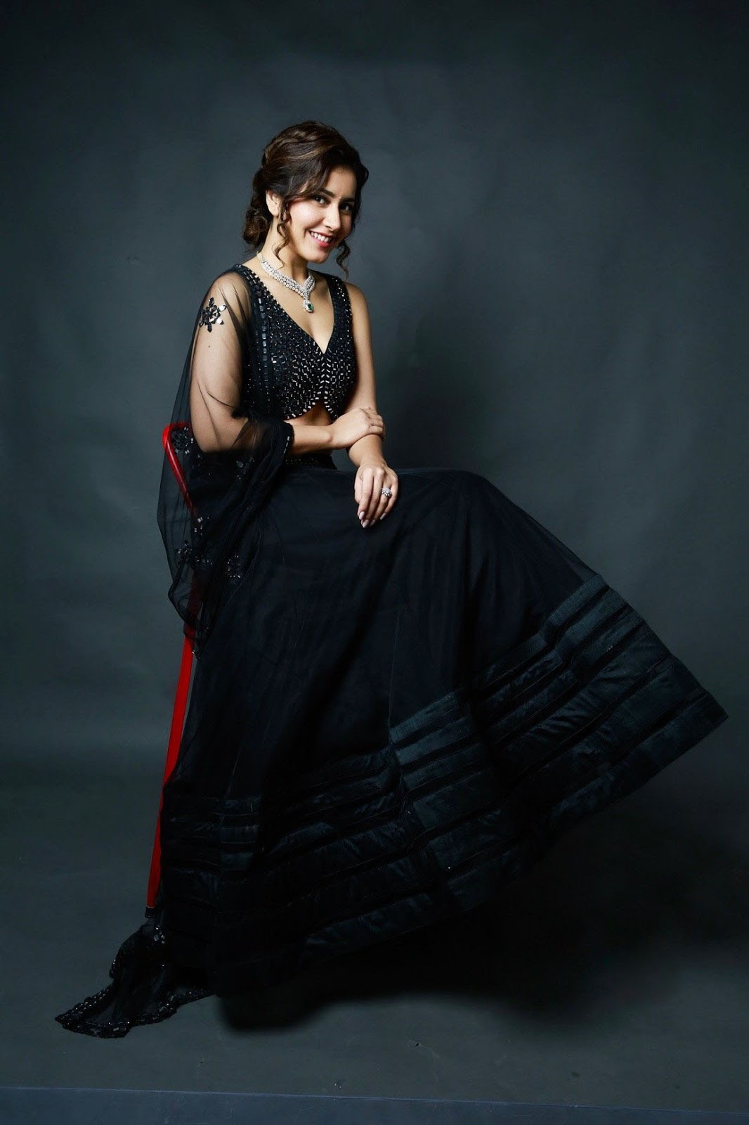 Actress Rashi Khanna Glam Stills In Black Dress