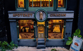 06-Apothecary-at-night-AnonyMouse-www-designstack-co
