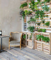 Pallets de madera reutilizados para colocar plantas Pallets de madera reutilizados para colocar plantas