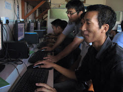 Students learning how to do 3D modeling with help from Oyimpong Imchen