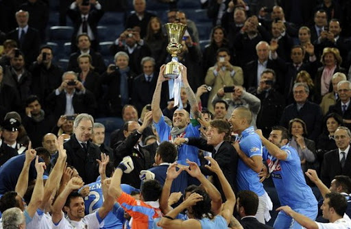 Napoli captain Paolo Cannavaro lifts the trophy after winning the Coppa Italia