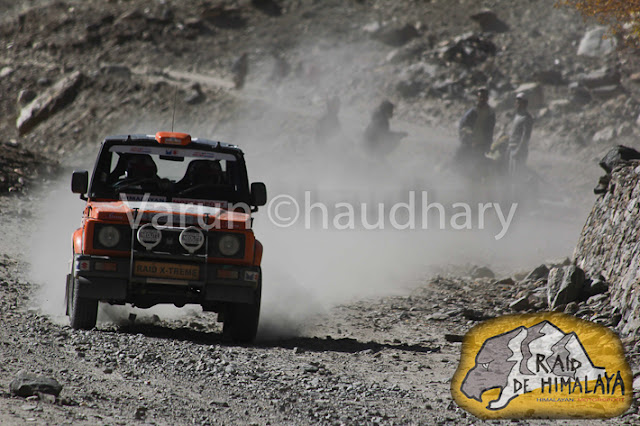 Maruti Suzuki Raid-de-Himalaya is India's toughest and most demanding motorsport rally which happens in Northern states of India - mainly Himachal Pradesh and J&K. Raid De Himalaya is open for both car and bike enthusiasts .... and for professional as well as amateur motorsport lovers.  Let's have a quick PHOTO JOURNEY by Varun Chaudhary (from Raid de Himalaya 2011)This journey is only covering some of the action shots of cars and another photo journey on bikes will follow soon... Above photograph shows a car flying across the snow covered hills and monasteries on the way while going towards J&K....The participants drive through some of the world's highest motorable roads and passes in the Himalayas like Jalori Pass, Rohtang Pass, Kunzum La, Baralacha La, Tanglang La & Khardung La, through really difficult terrains in Lahual and Spiti valleys in the Ladakh region.During Raid de Himalayas, all participants need to take care of their food on their own. Folks from various parts of country and world come to Himachal for Raid de Himalayas. Many folks have real craze about riding in Himalayas and face the real challenge in the world of motorsports.Most of the drive is through  snow covered hills of Himalayas, beautiful water streams and at times, temperature below -15 degree Celsius. On an average, a participant covers a distance of 300 kms every day in this approximately 1800 km and week-long motoring event.During the Raid, environment changes suddenly... These cars move so fast and suddenly snow covered hills touch to a land with rocky & dry hills... Most of the vehicles used during the rally for marked fit before start, otherwise folks are not allowed to continue to take care of security of participantsMaruti Suzuki and Himalayan Motorsport Association organize the Maruti Suzuki Raid-de-Himalaya every year  which actually need hard work and preparations. Spirit of motoring enthusiasts and Maruti Suzuki's commitment to promote motorsport in India has kept it going - year after year.It's always a wonderful experience to capture these folks at special moments with special effects.... Panning could be one of the very good ways of showing real action during Raid de Himalaya !!!If I clearly read, it's Sarachu written over the meter-board on road-side...Every year, more and more people participate in the Maruti Suzuki Raid-de-Himalaya and some of them from abroad as well. Maruti Suzuki Raid-de-Himalaya is the only Indian motorsport event listed on the off-road rallies calendar of FIM (Federation Internationale Motorcyclisme), Geneva, Switzerland. Only 12 international motoring events world-wide are listed in this calendar.The Maruti Suzuki Raid-de-Himalaya is held around October, just before the onset of winters in the Himalayan region and passes through lot of snow covered hills !!!The Maruti Suzuki Raid-de-Himalaya runs in three separate versions: Xtreme, Adventure Trial and Bike Xtreme !!!Xtreme is the toughest of Raid de Himalaya and it's open only to those 4 wheeler drivers who have prior rallying experience and have competed in one of the earlier editions of the Maruti Suzuki Raid-de-Himalaya or Maruti Suzuki Rally Desert StormAdventure Trial is open to those motor-sports enthusiasts who would like to take on the Himalayas but without the tough competition, difficulty and stress involved in the Xtreme. This section is open only to stock cars and only certain safety related modifications would be allowed in the competing cars. This is where first timers would fit in...   Car Category & SUV Category    Bikes Xtreme is open to bikes of all types and makes but there are certain regulations that they have to adhere to. The bikers are probably the bravest of the Raiders, as they have to face the hostile weather, terrain without the comforts of a cabin surrounding them.Some of the online media websites regularly track the progress of this one week long rally - Raid de Himalaya... One of the example can be seen at http://hillpost.in/category/sports/raid-de-himalayaAll these colorful cars in various sizes, shapes and models don't run but literally fly in air. Each car rider need to come with a navigator who can guide the rider about appropriate details about location, distance, timing and other security measures about controls etc.Also each team to make sure that helping car is coming along which has all necessary equipments for repairing the cars/bikes if needed... Many times these enthusiasts know much about their cars/bikes, but it's preferred to have specialists with them to be on safer side.It's of course an expensive affair and many folks get appropriate sponsorships to join such rallies. From vehicle to maintenance and all other miscellaneous expenses are too much... Even most of the vehicles are very well designed for such rallied.... They need to be really special to be a part of Raid de Himalaya....Raid de Himalaya 2011 was 13th event and 150+ participants came this time !!So here ends the cars rally during Raid de Himalaya 2011 and Bikers rally will follow soon... Varun Chaudhary who clicked all these photographs can reached at - Facebook Gmail