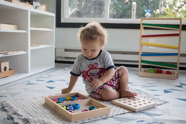Introducing a Montessori work mat or rug with a toddler at home 