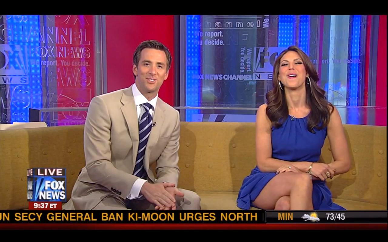 Nicole Petallides legs on the Fox and Friends couch.