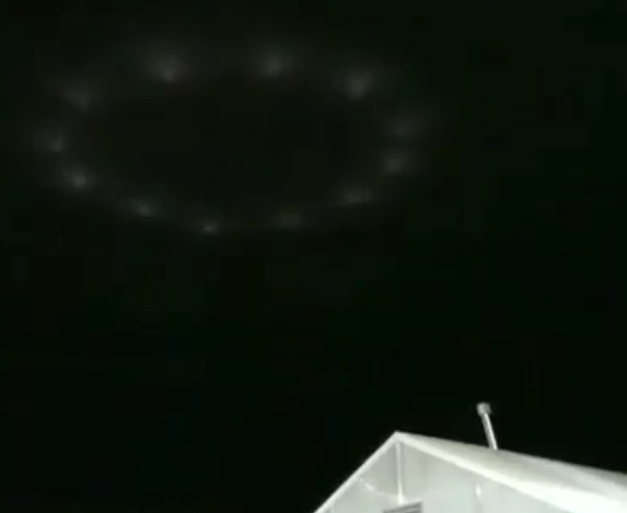 UFO seen over Walmart's car park and hovering over a family.