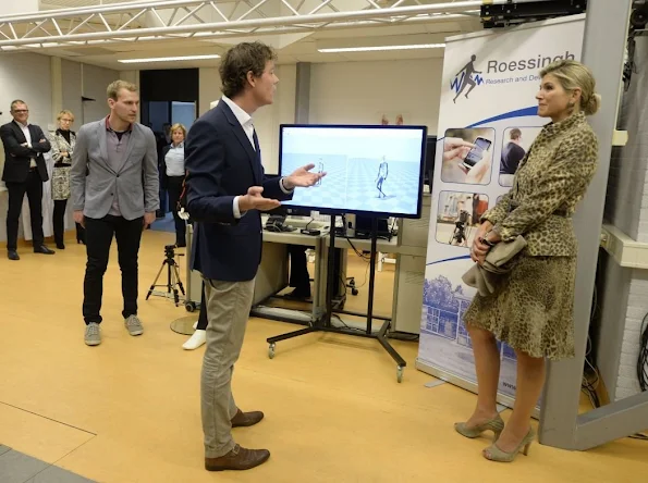 Queen Máxima visits Roessing Research and Development Centre in Enschede. Queen Maxima wore Natan Leopard Dress