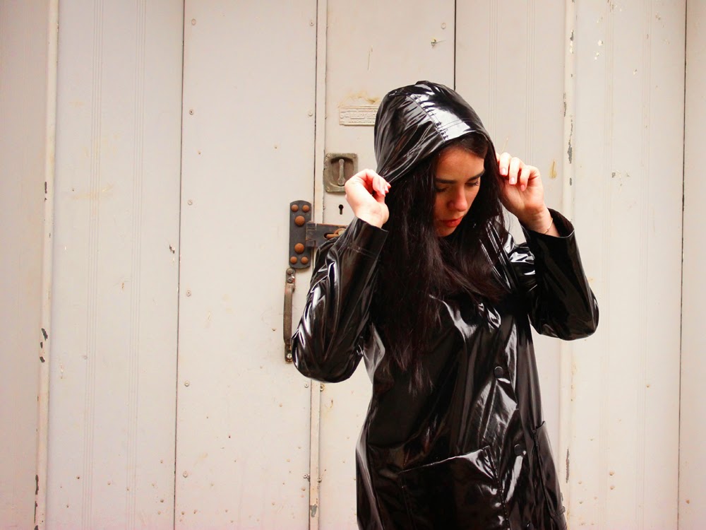 London fashion blogger Emma Louise Layla in black patent Petit Bateau raincoat