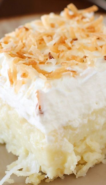 Coconut Cream Pie Bars Recipe ~ they are HEAVENLY... creamy coconut, a cloud of whipped cream, and a buttery shortbread crust