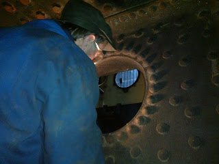 Graham checking the firehole mouthpiece and rivets (Graham Morris Engineering Ltd, 07734560802)