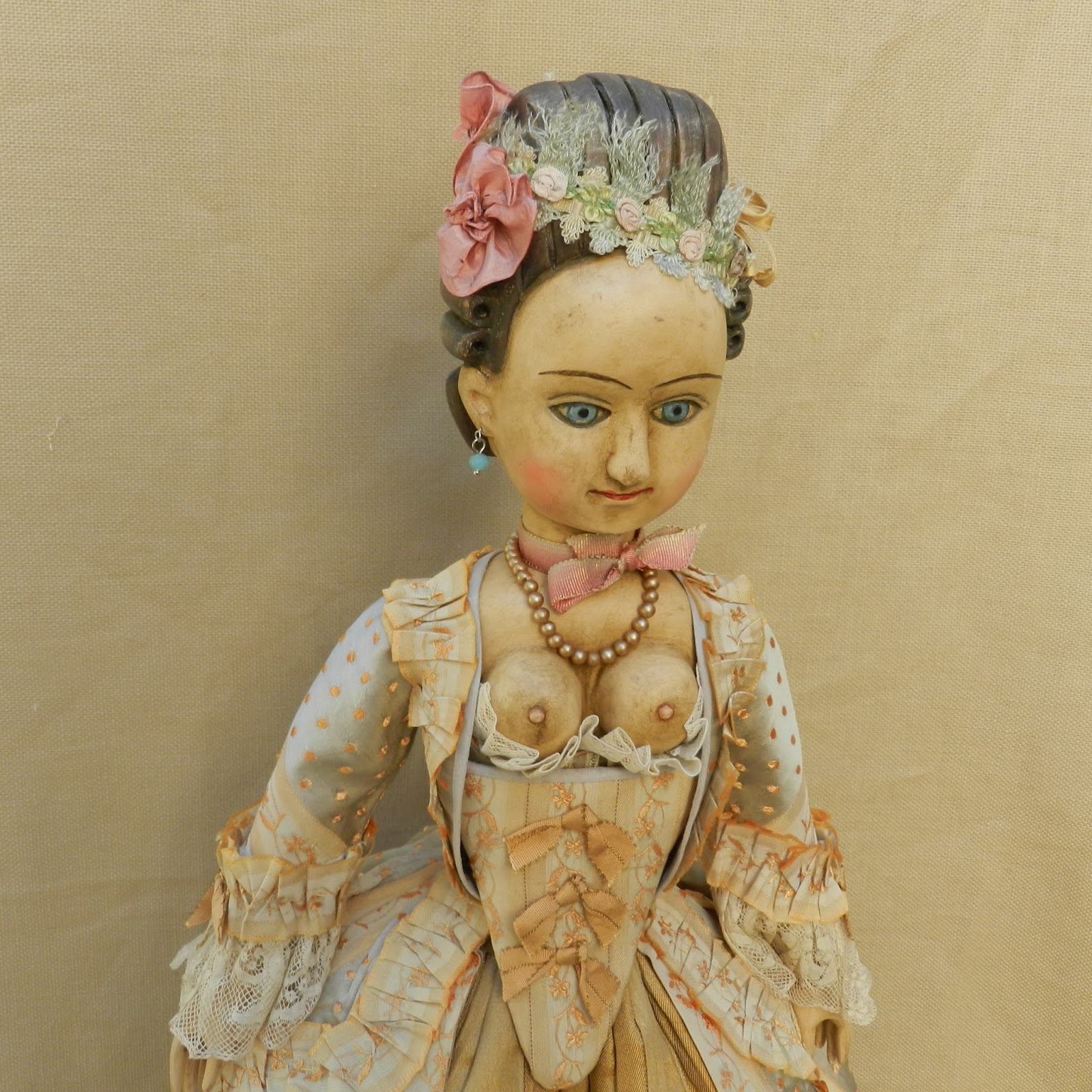 old wooden doll