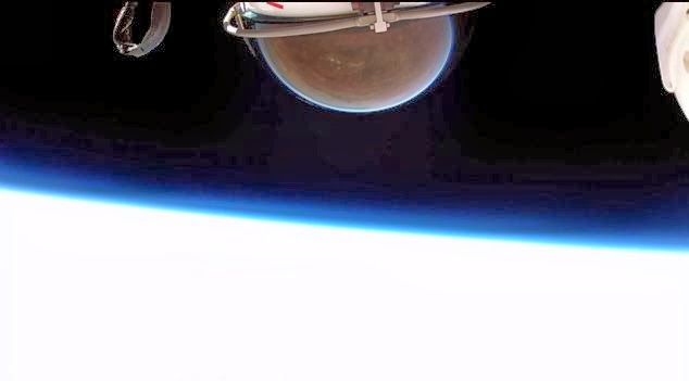 A chest-mounted camera capture's Baumgartner's helmet and the edge of space - What it’s REALLY like to jump from space - New footage of Felix Baumgartner's jump