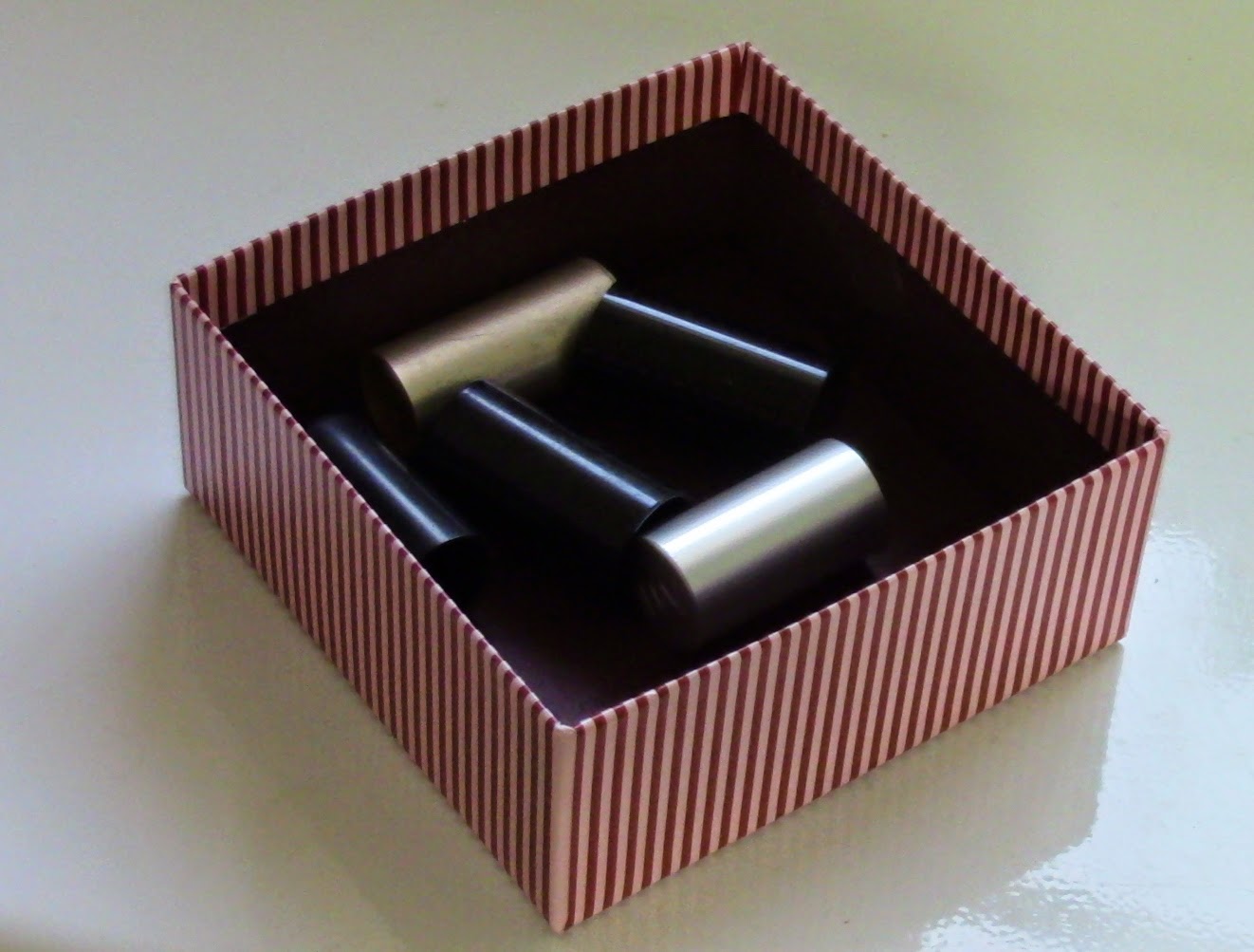 box of lipstick lids