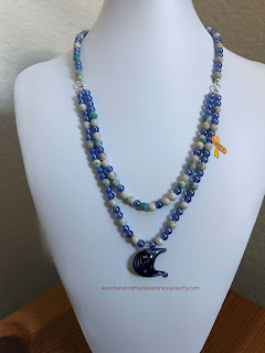 copyright of TLCS' Creations and Handcrafted Awareness Jewelry