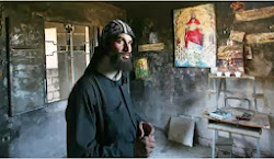 Egyptian priest checking his burned church