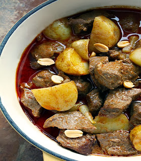 Thai Massaman curry of beef and potatoes in a lightly-spiced massaman curry spice base