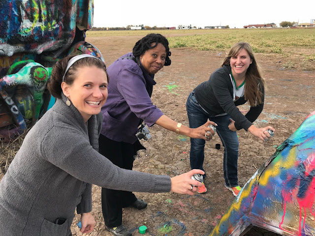 Tourists come from all over the world to leave their mark one spray paint can at a time on one of the ten classic Cadillacs buried nose first into the former wheat field- better known as Cadillac Ranch in Amarillo, Texas.