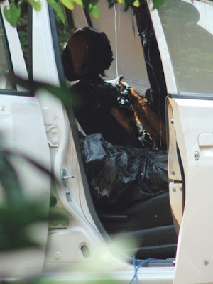 Mayat wanita ditemui dibungkus dengan plastik hitam dalam kereta.