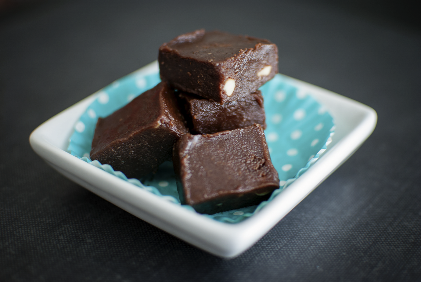 Low Carb Sugar Free Chocolate Peanut Butter Fudge Squares Stacked On A Plate 