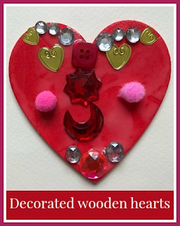 Decorated wooden heart magnets for Valentine's Day