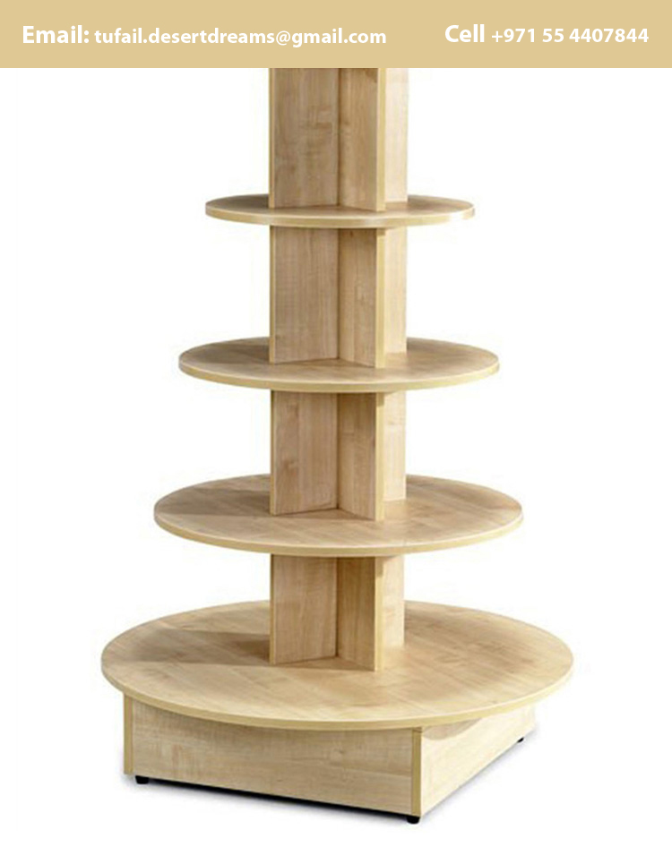 DESIGN AND MANUFACTURER WOODEN DISPLAY STANDS UAE.