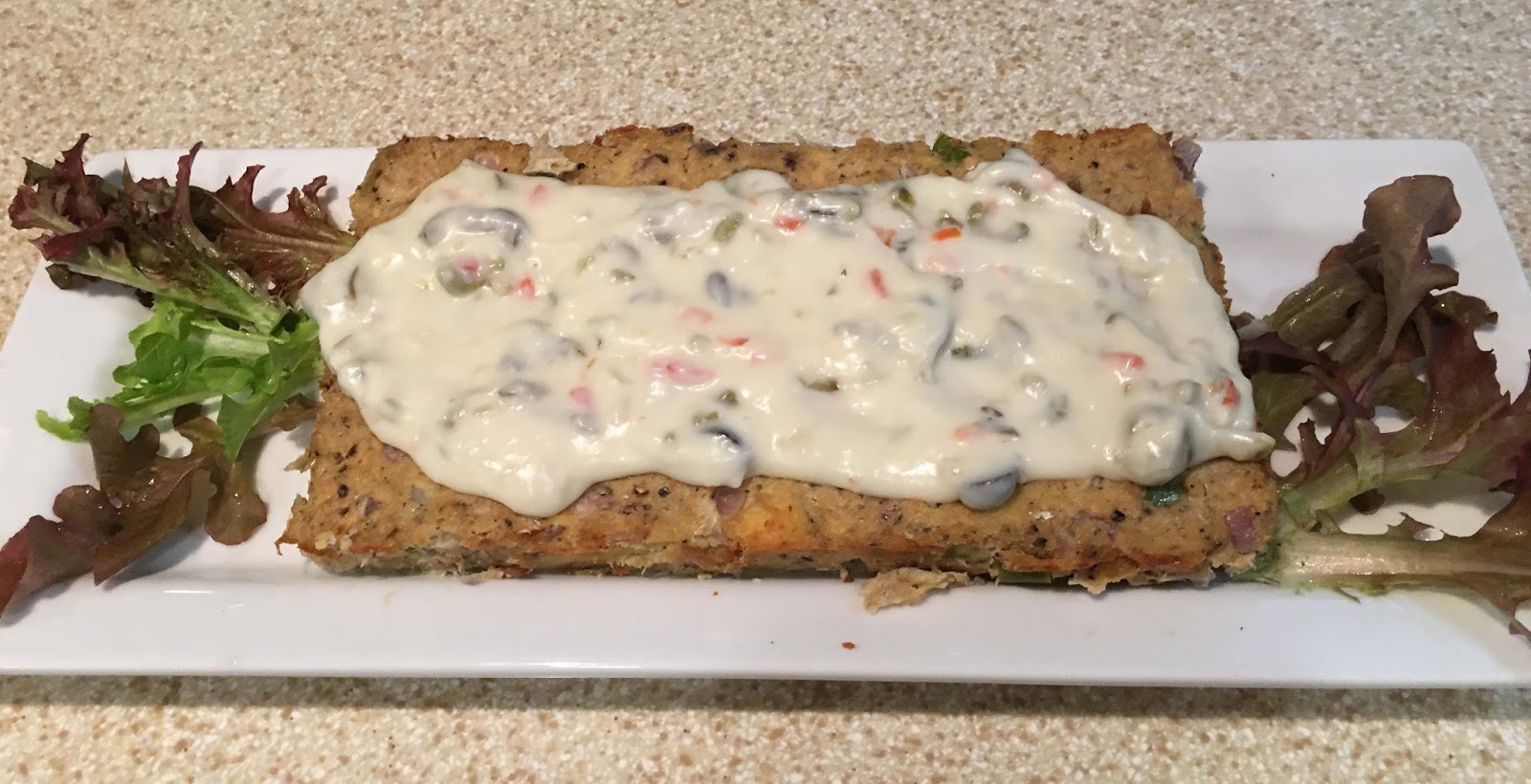 Salmon Loaf with Olive Sauce