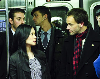Jonny Lee Miller and Lucy Liu as Sherlock Holmes and Joan Watson in Elementary Pilot Episode Jonny Lee Miller and Lucy Liu as Sherlock Holmes and Joan Watson in Elementary Pilot Episode
