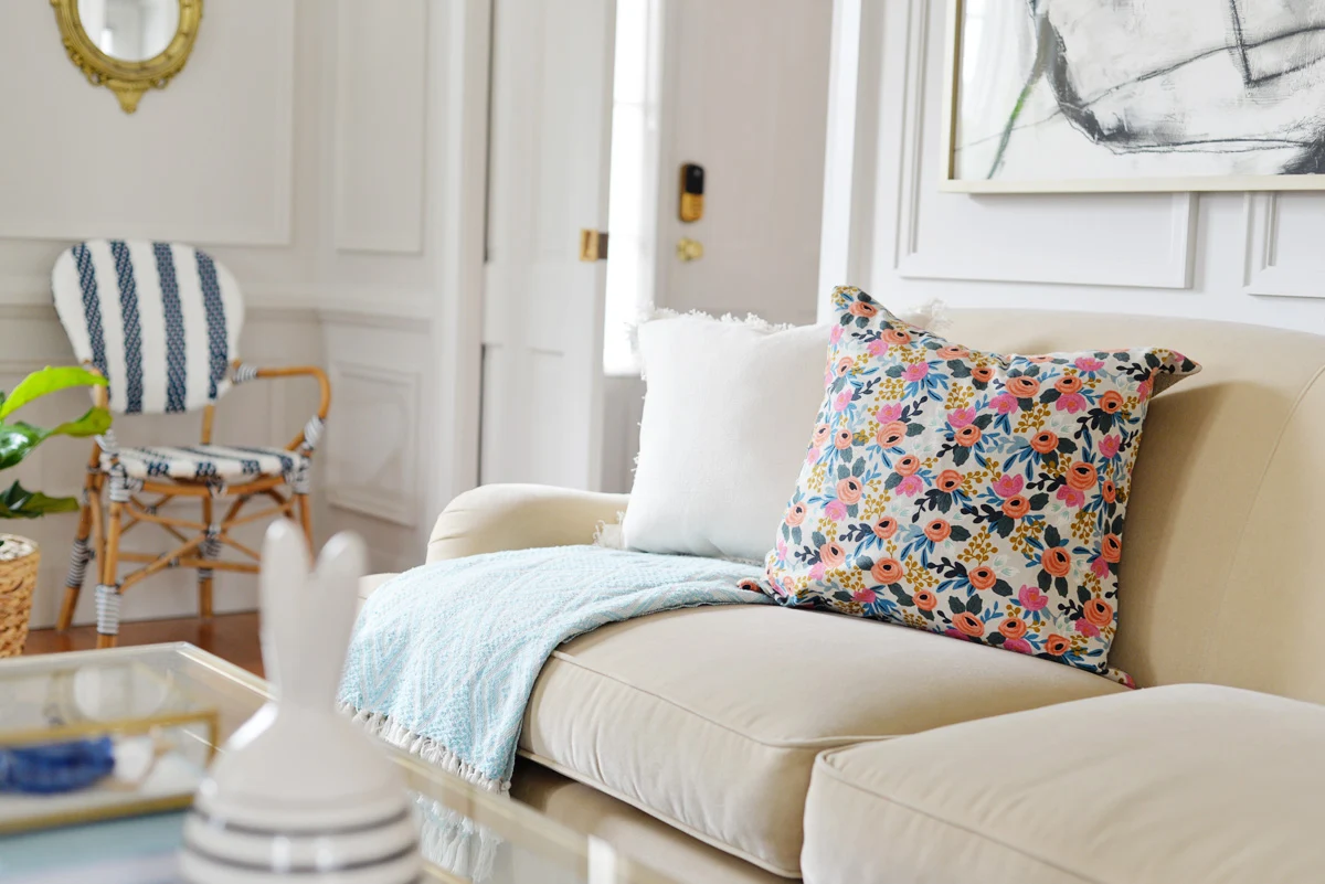 spring decorating, floral pillow, striped bistro chair