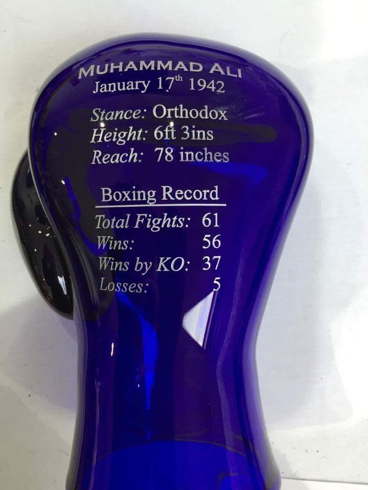 punching with Parsons Bristol blue glass Muhammad Ali boxing glove