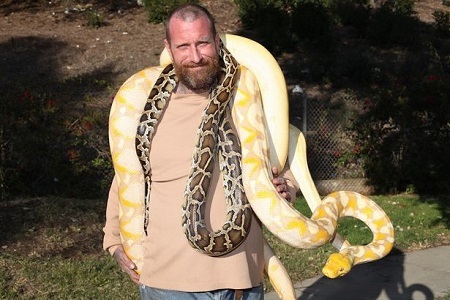 Shocking! Father of Three Allows His Kids Play With His Huge 19ft Pet Python (Photos)