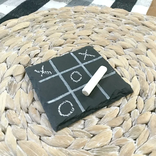 Tic-Tac-Toe Chalkboard game on a woven mat