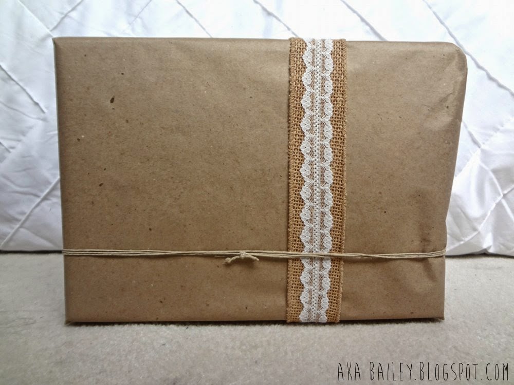 Brown paper gift wrap with burlap, lace and hemp twine