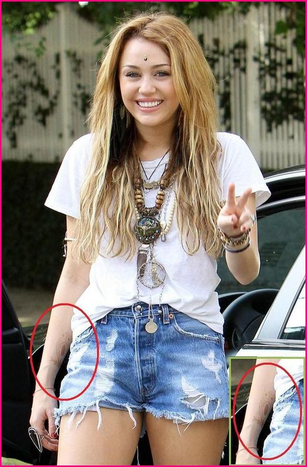 Miley Cyrus Tattoo 2011 Posted by hang at 1225 AM