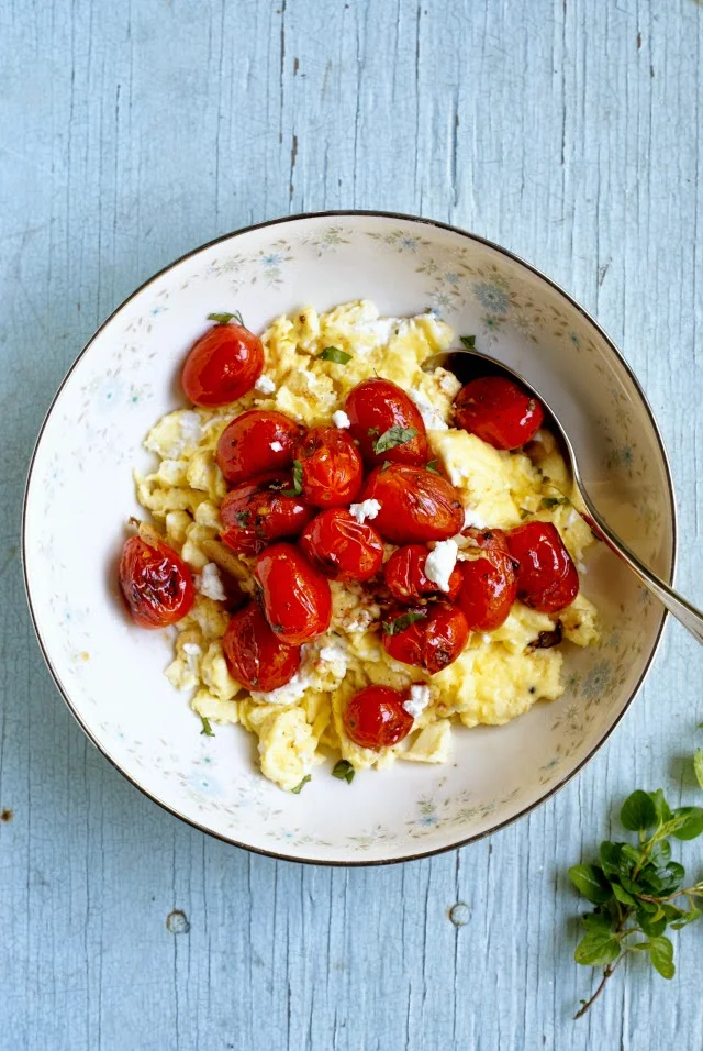 Goat Cheese Scrambled Eggs with Blistered Tomatoes | thetwobiteclub.com