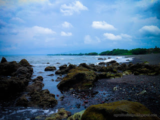 Natural Beach View Of The Village With Coral Reefs By The Beach, Umeanyar, North Bali, Indonesia