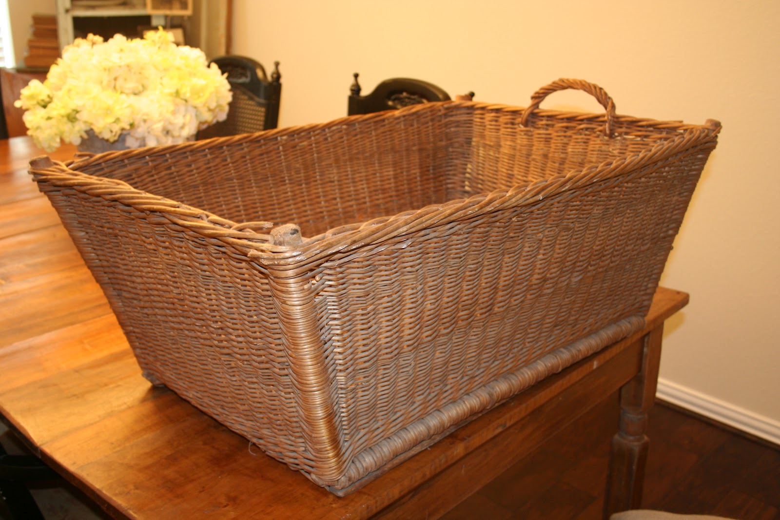 The Farmhouse Porch Is this a French Laundry Basket or what?!? I need