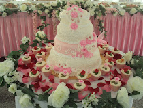 4 Tier Steambuttercream+30 cup cakes