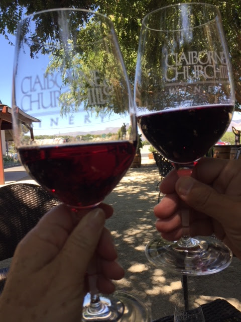 Claiborne & Churchill wine glasses with wine