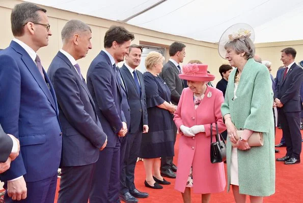 President Donald Trump and First Lady Melania Trump, Theresa May, Justin Trudeau, Xavier Bettel. Meghan Markle