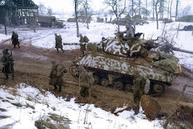 Snow-camouflaged M4A3 76w Sherman tank color photos of World War II worldwartwo.filminspector.com