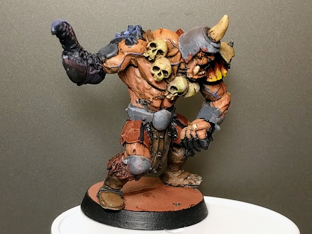 Skull bandoliers are the latest in ogre fashion Ogre side view