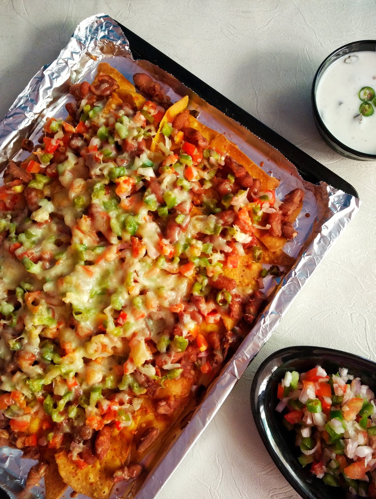 Nachos Supreme with Kidney Beans and Veggies Loaded Vegetarian Nachos