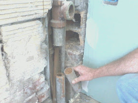 Before Installing the Cabinets I checked the Drain Pipe and  found that it was clogged.  We then replaced the entire Drain pipe and Vent Stack for the plumbing in the Kitchen.