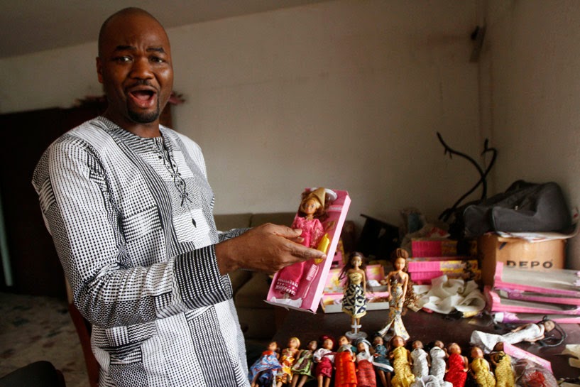 Taofick Okoya with his Nigerian Dolls