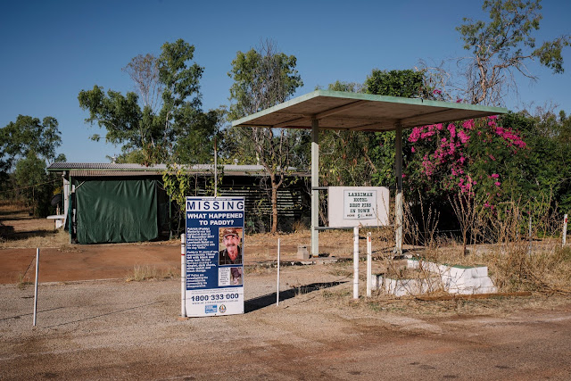 Eight months after he disappeared, a missing person sign remains outside the Larrimah, Australia, home of Paddy Moriarty.