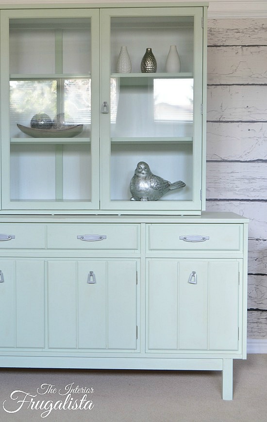 A vintage mid-century china cabinet makeover and how to give it a much lighter and brighter look with pretty Pistachio mint green chalk style paint.